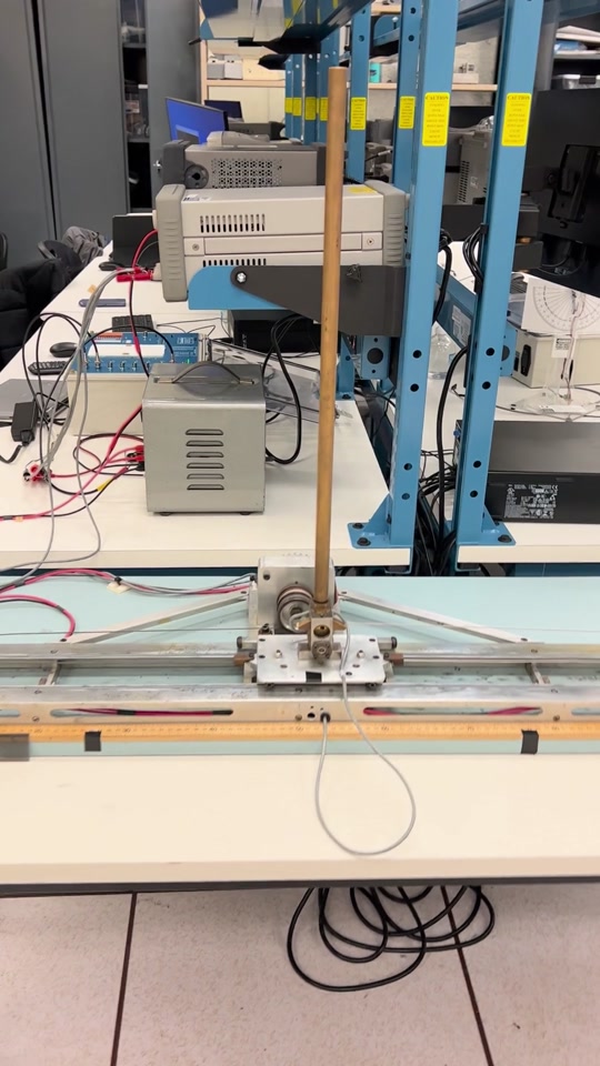 Original inverted-pendulum hardware demonstration frame, with the cart and upright rod